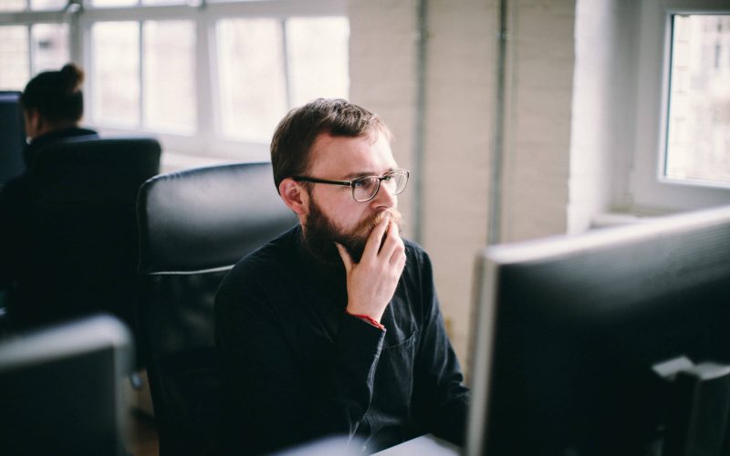 mid-adult-man-working-office